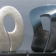 CONVERSATION, White Alabaster / Canadian Chlorite<br>  14 IN. H / 21 IN. W / 6 IN. D / 49 LB<br> Artist's Collection
